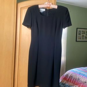 Maggy London timeless black dress. Size 6 with seen in lining. Beautiful detail